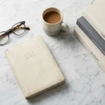 A happy family relaxing in a bright, high-end living room with warm natural lighting.
