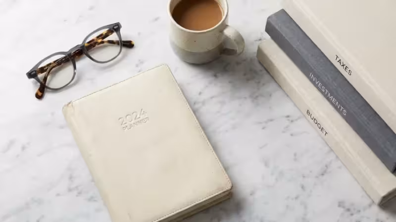 A happy family relaxing in a bright, high-end living room with warm natural lighting.